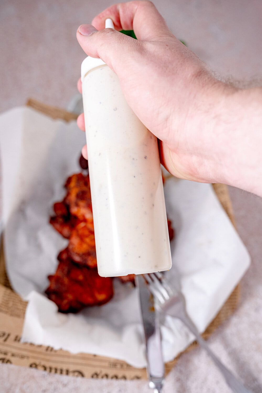 Alabama White Sauce in a squeeze bottle