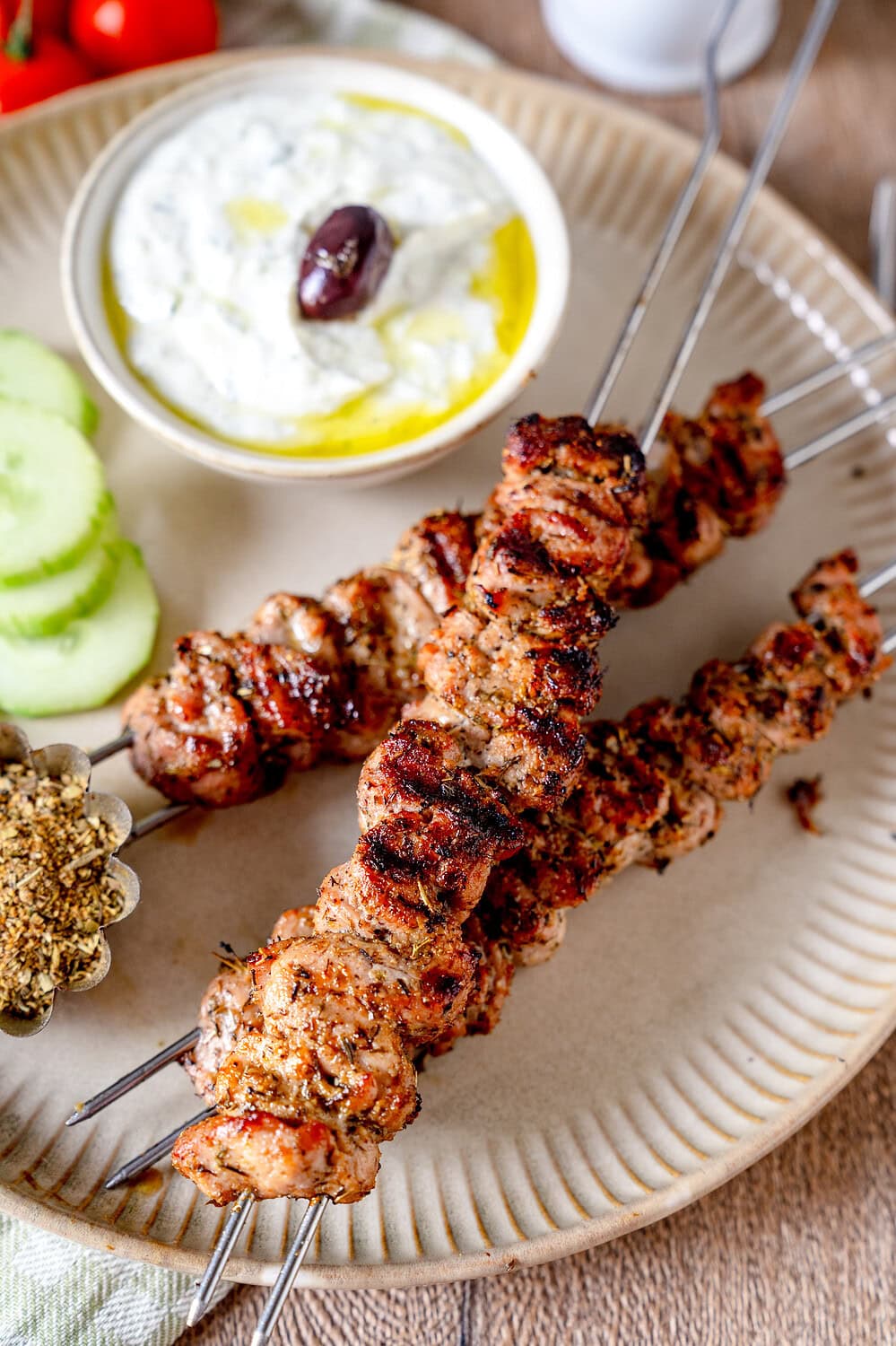 Freshly grilled gyros skewers with tzatziki
