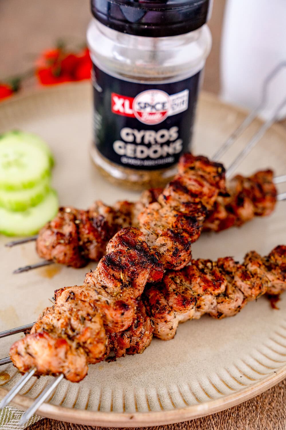 Gyros grill skewers with an XL spreader of Gyros Gedöns in the background