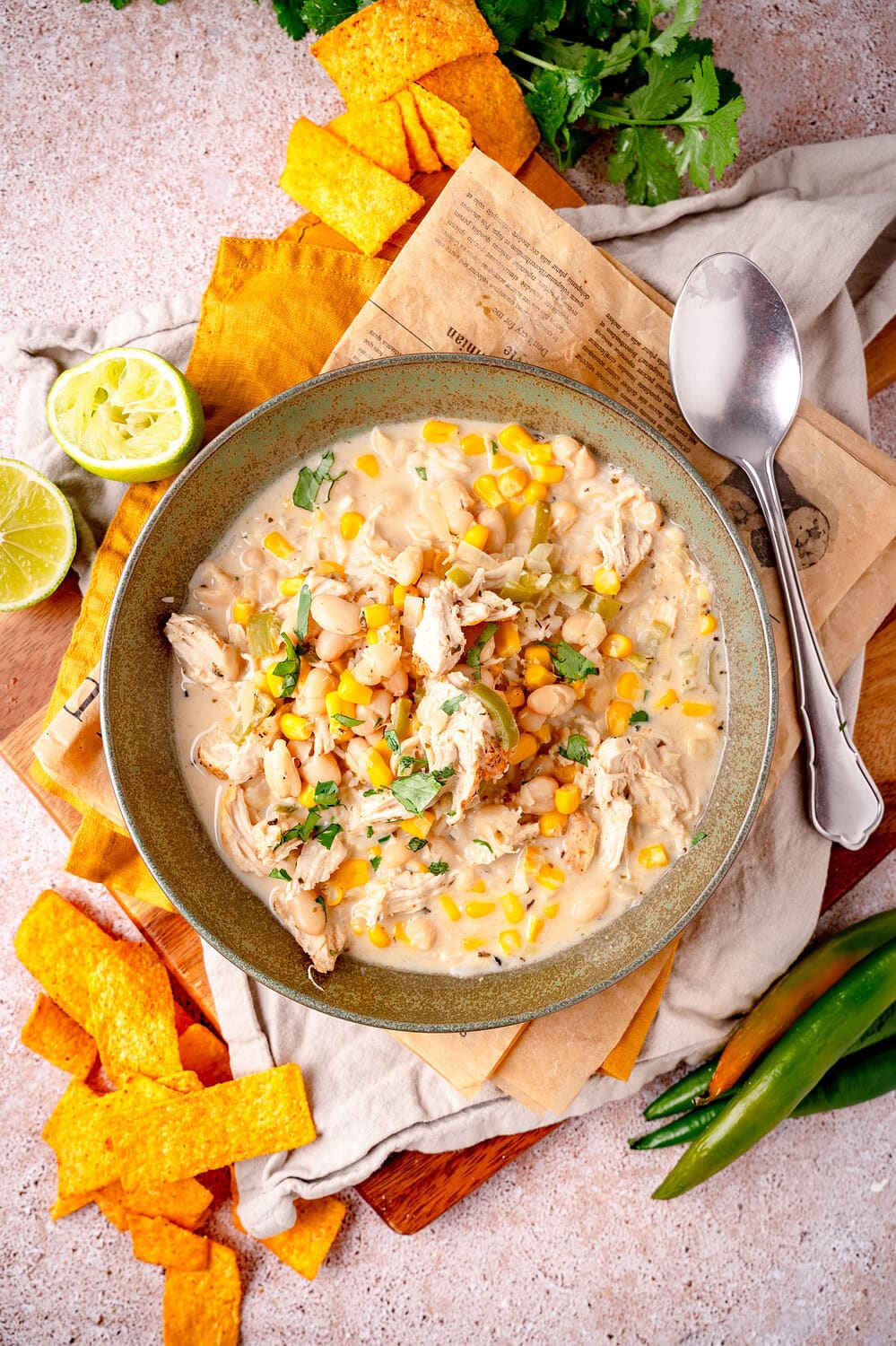Delicious white chicken chili with corn, rice and lime, perfect for cold days.