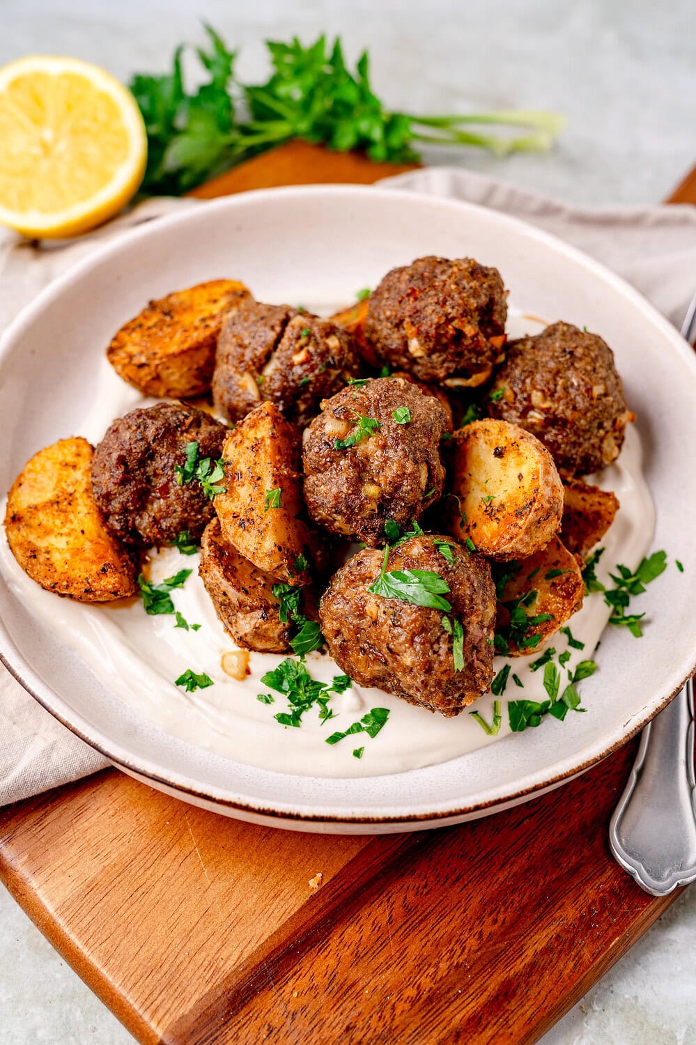 Köfte meatballs with baked potatoes