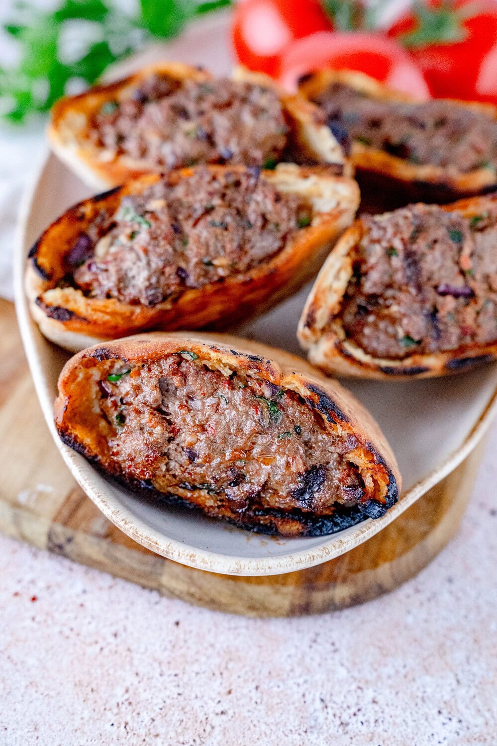 Arayes - stuffed pita breads with ground beef on a plate